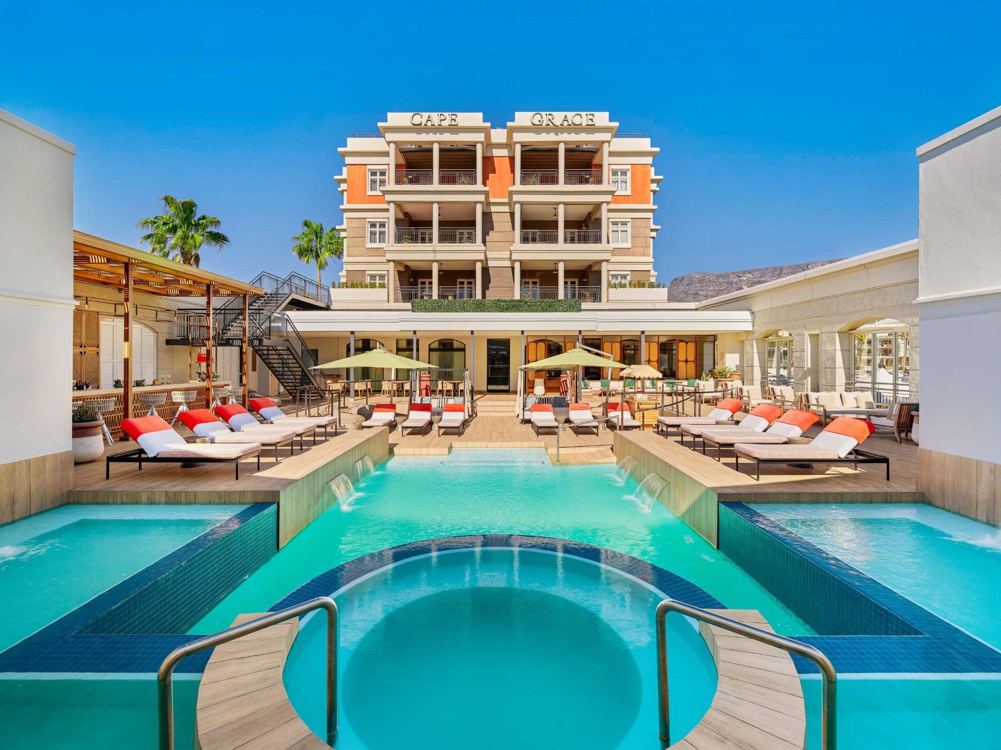 The Cape Grace pool deck on a bright summer day