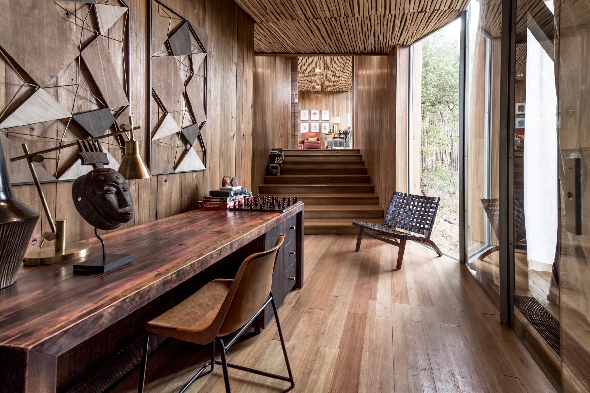 Singita Sweni Lodge — a timber-clad suite interior in the Lebombo concession